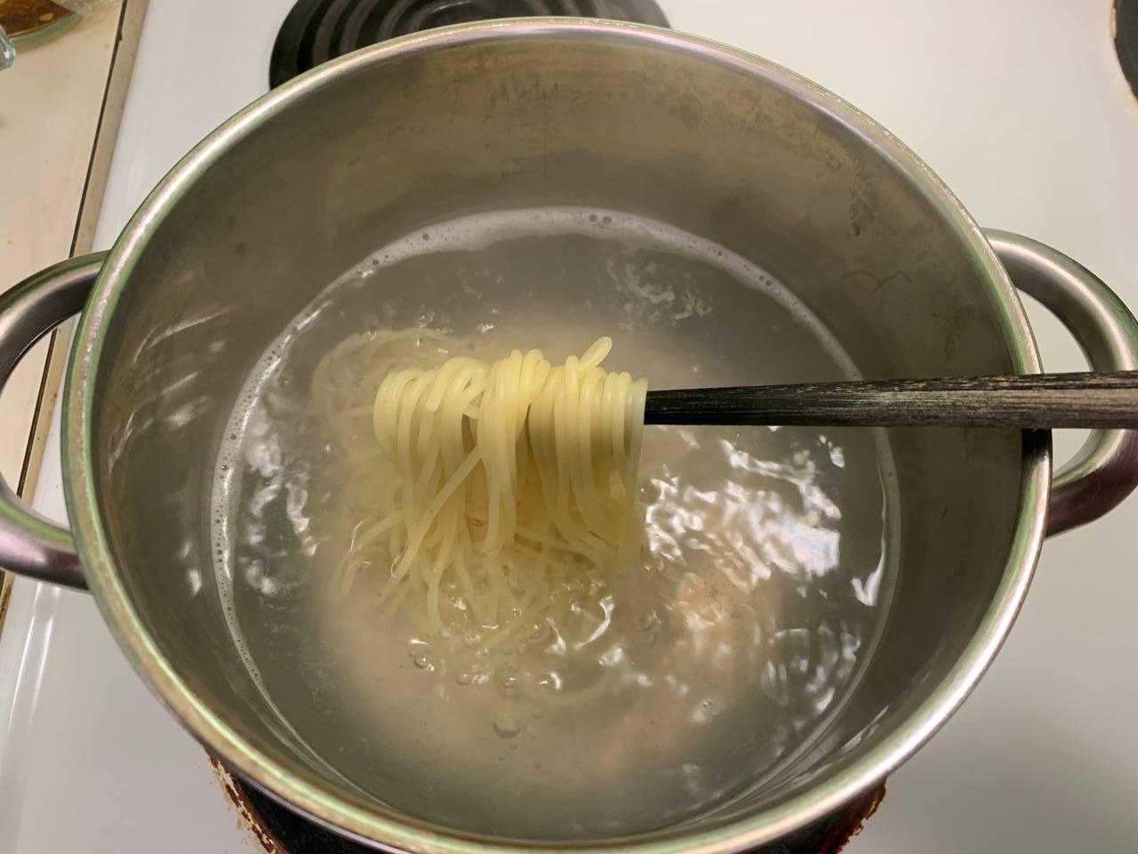 Boil 1 roll of <b>noodles</b> for 5-7mins or until al dente. While it boils, move on to next step.