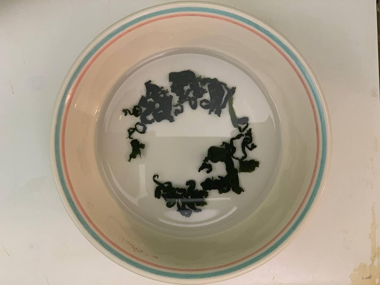 In a bowl of water, add a tsp or pinch of <b>wakame seaweed</b>. While it soaks, move on to next step. (It will expand in 5 mins)